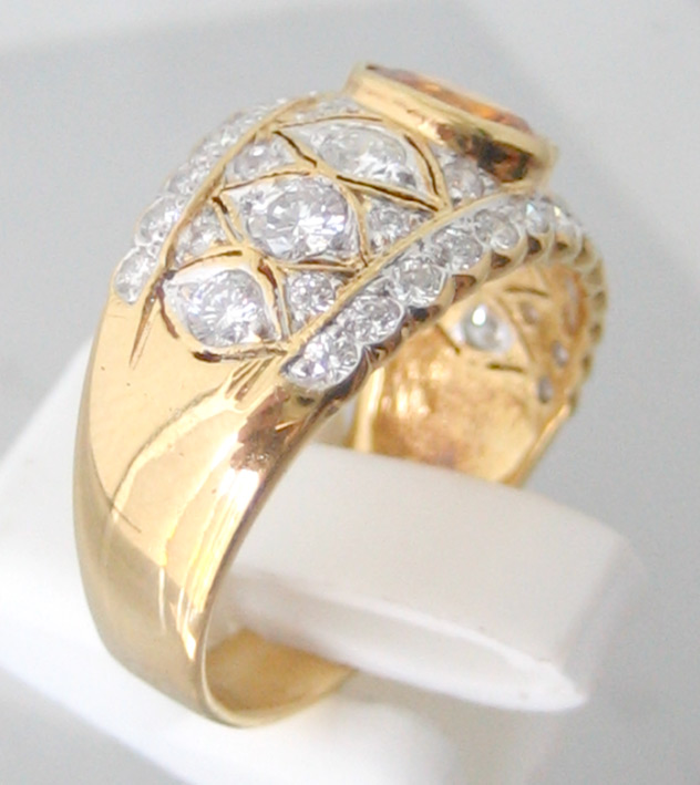 แหวนทองคำฝังเพชรแท้รวมน้ำหนัก 1.2 กะรัต ประดับพลอยบุษราคัมเจียรไนทรงไข่ ตัวเืรือนทองคำ 90 น้ำหนักรว 4