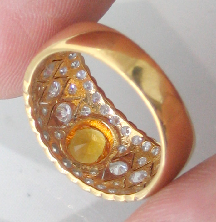 แหวนทองคำฝังเพชรแท้รวมน้ำหนัก 1.2 กะรัต ประดับพลอยบุษราคัมเจียรไนทรงไข่ ตัวเืรือนทองคำ 90 น้ำหนักรว 5
