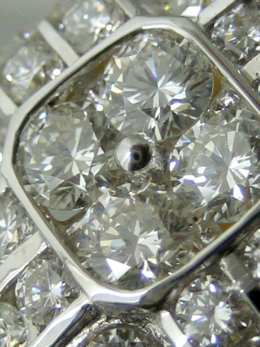 แหวนทองคำประดับเพชรแท้เม็ดหลักขนาด 0.14x4 กะรัต เม็ดรองขนาด 0.04x32 กะรัต เม็ดย่อยรวมน้ำหนัก 0.80 กะ 1