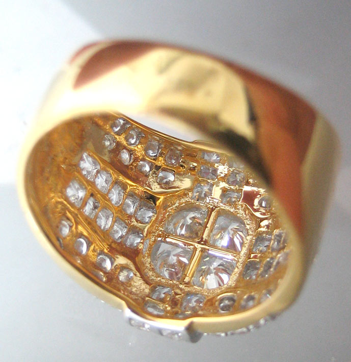 แหวนทองคำประดับเพชรแท้เม็ดหลักขนาด 0.14x4 กะรัต เม็ดรองขนาด 0.04x32 กะรัต เม็ดย่อยรวมน้ำหนัก 0.80 กะ 4
