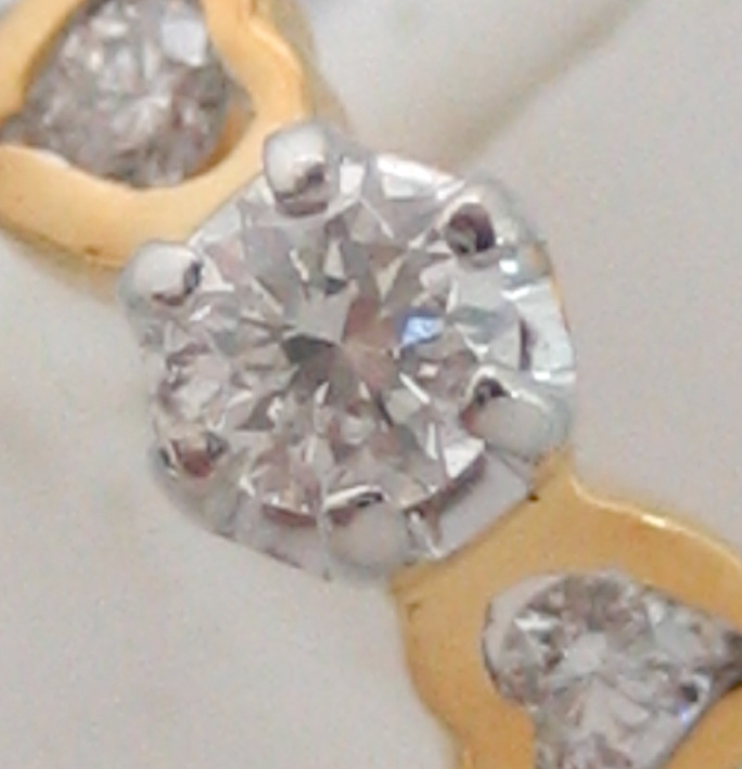 แหวนทองคำประดับเพชรแท้รวมน้ำหนัก 0.20 กะรัต เบลเยี่ยมคัต น้ำขาว 95-96 กะรัต ตัวเรือนทอง 90 น้ำหนักร 1
