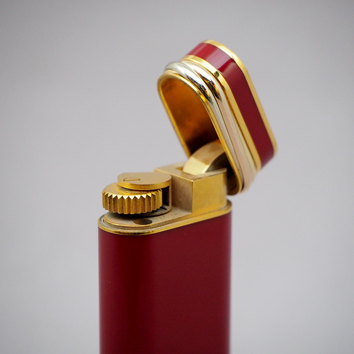 ไฟแช็ก CARTIER Trinity gold original 1990-1999 ระบบเติมแก๊ส ใช้ได้ทั้งชายและหญิง  ตัวเรือนแลคเกอร์แด 1