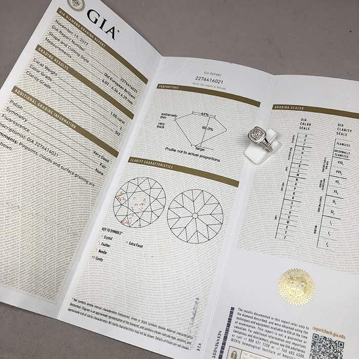แหวนทองประดับเพชรแท้เม็ดหลักขนาด 1.05 กะรัต L color มาพร้อมใบเซอร์ GIA เพชรเม็ดรองรวม 0.55 กะรัต ตัว 8