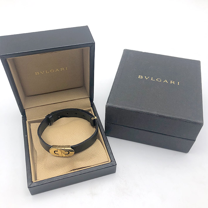 กำไลข้อมือ BVLGARI Parentesi ตัวเรือนชิ้นประดับ 18k Yellow gold สายหนังคล้องเป็นหนังลวดลายเส้นสีดำ ร 6